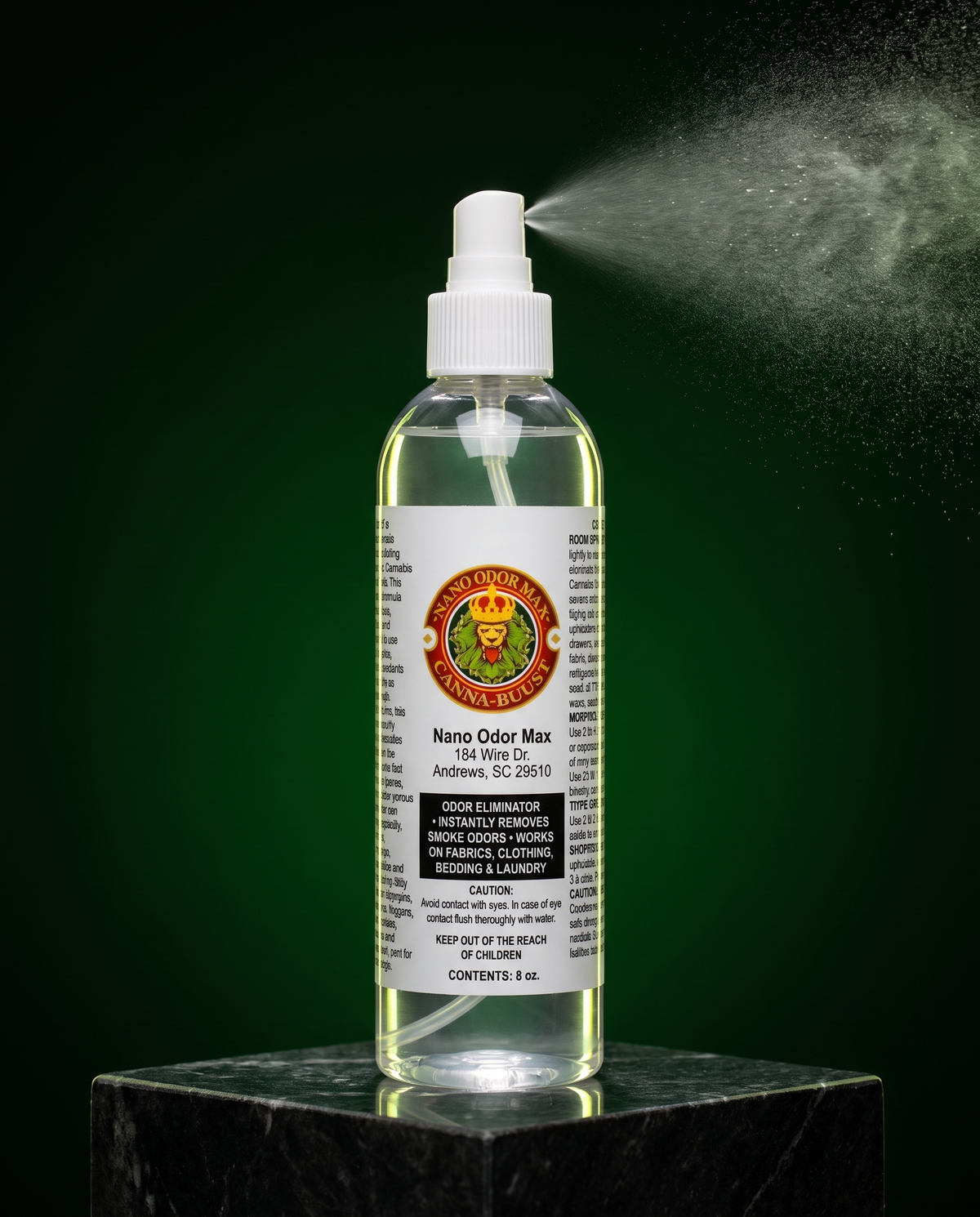 Nano Odor Max 8 oz bottle releasing a fine mist on a dark green background